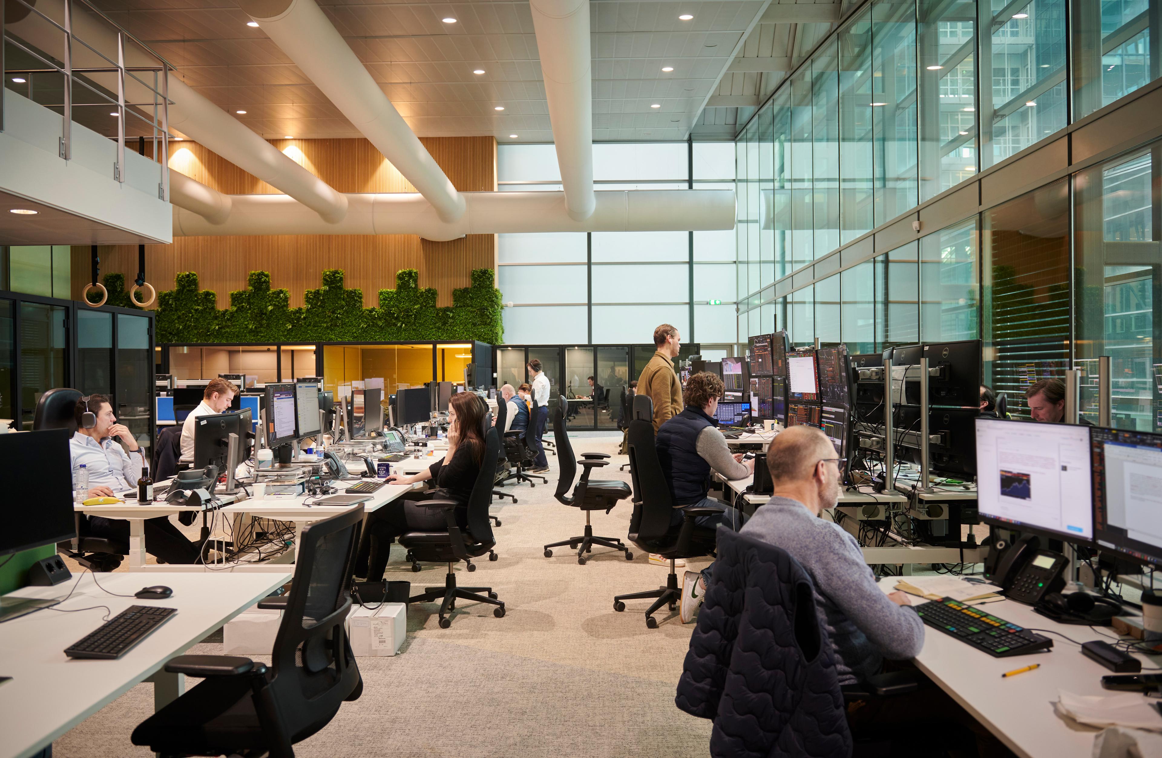 Photo of our beautiful office showing employees working 